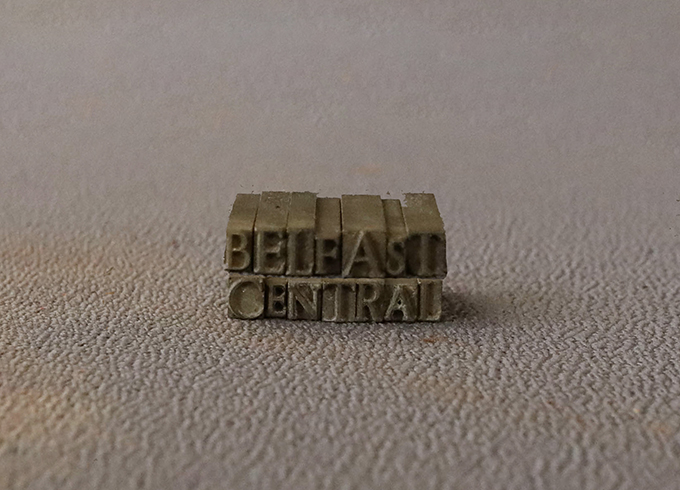 Feature tile 3, a letterpress set which spells out Belfast Central 