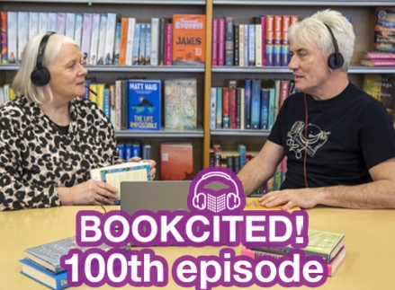 Photo of the Bookcited! podcast hosts Jillian and Pete as they celebrate the podcast's 100th episode