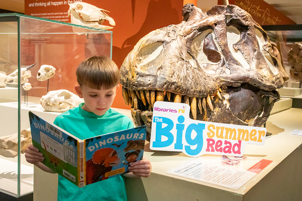 Zach discovers the world of dinosaurs with a roar-some read at the Ulster Museum, helping to launch this year’s Libraries NI’s Big Summer Read – a time-travelling reading challenge packed with prehistoric creatures, magical tales and future worlds!