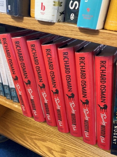 row of books by Richard Osman
