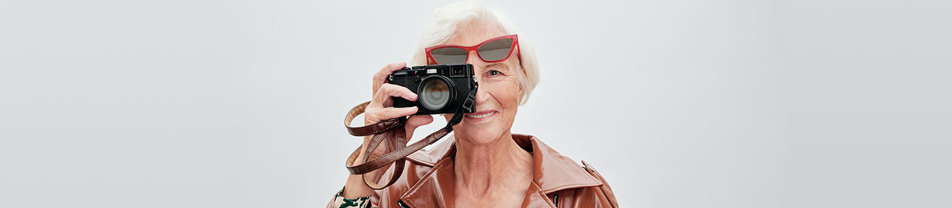 Woman taking a photograph with camera