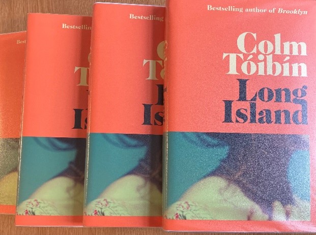 Stack of copies of Long Island by Colm Toibin