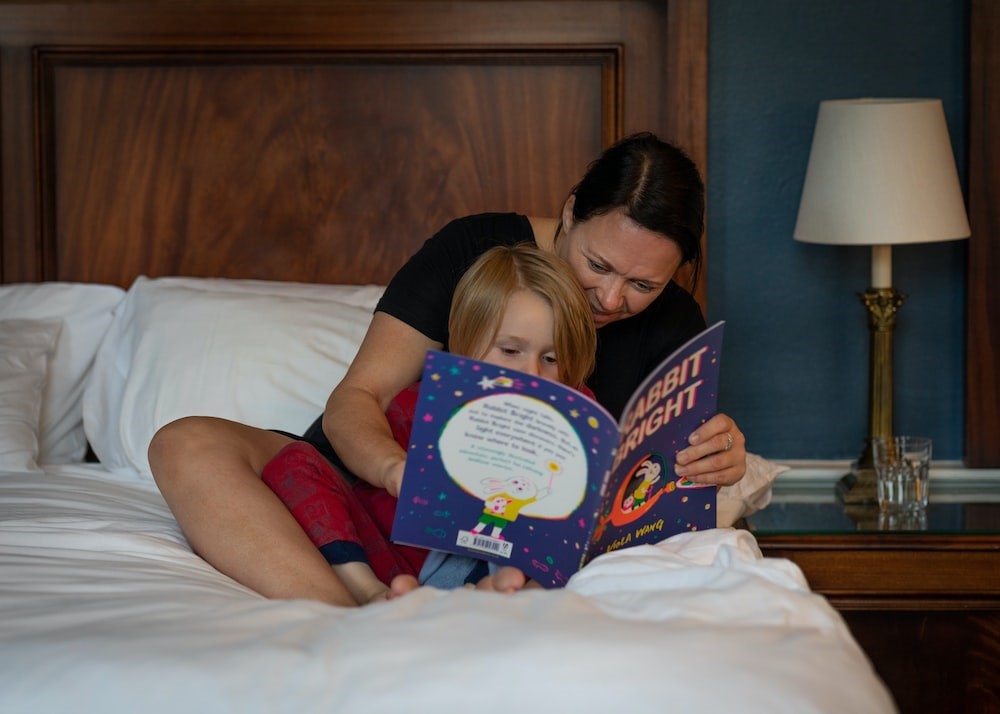 Mother and child reading a book