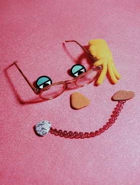 Funny face made out of various objects