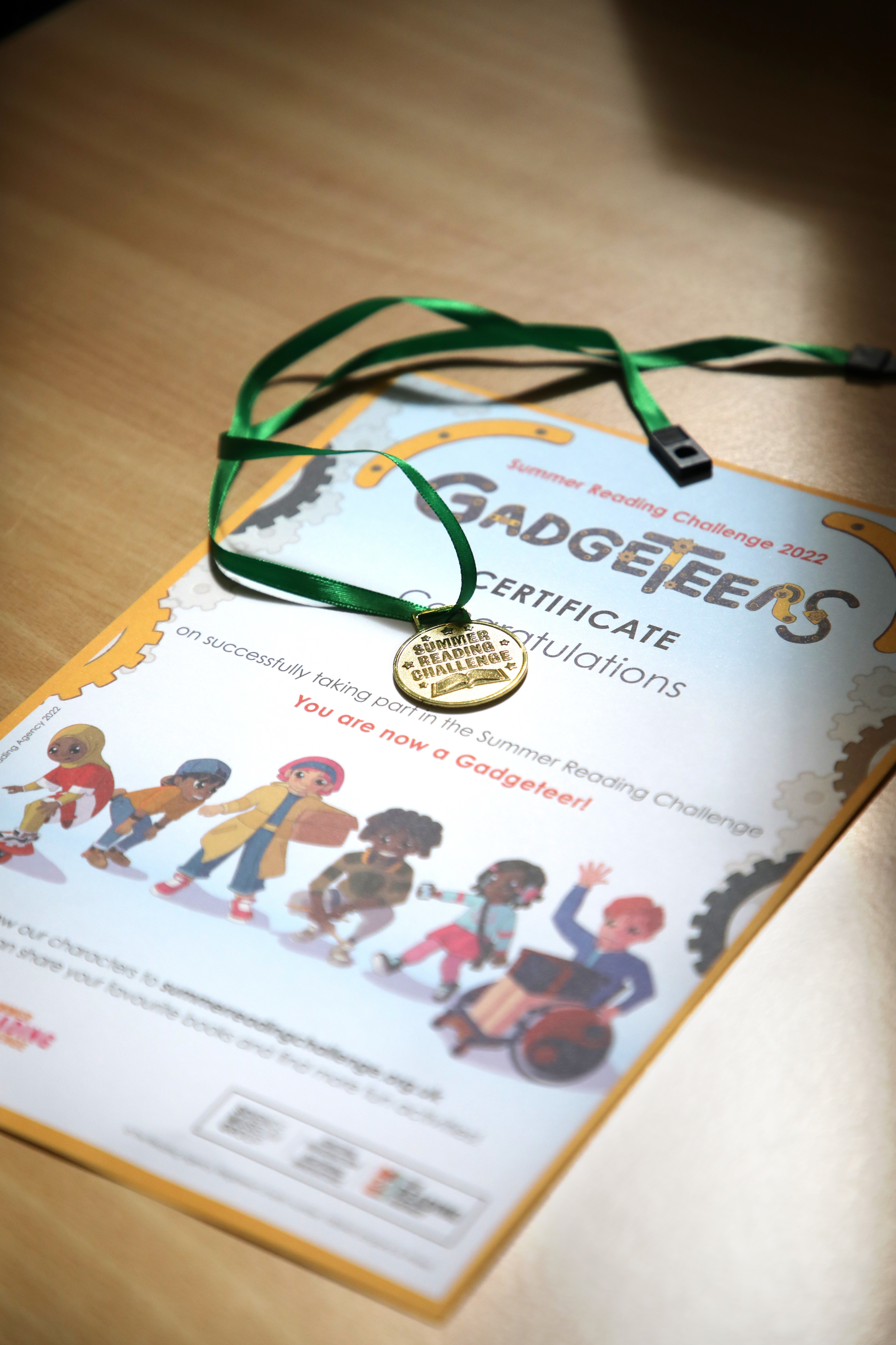 Summer Reading Challenge certificate and medal
