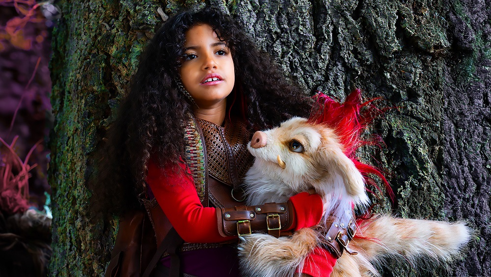 A photo of a young girl and a creature, a scene from Pickle Storm