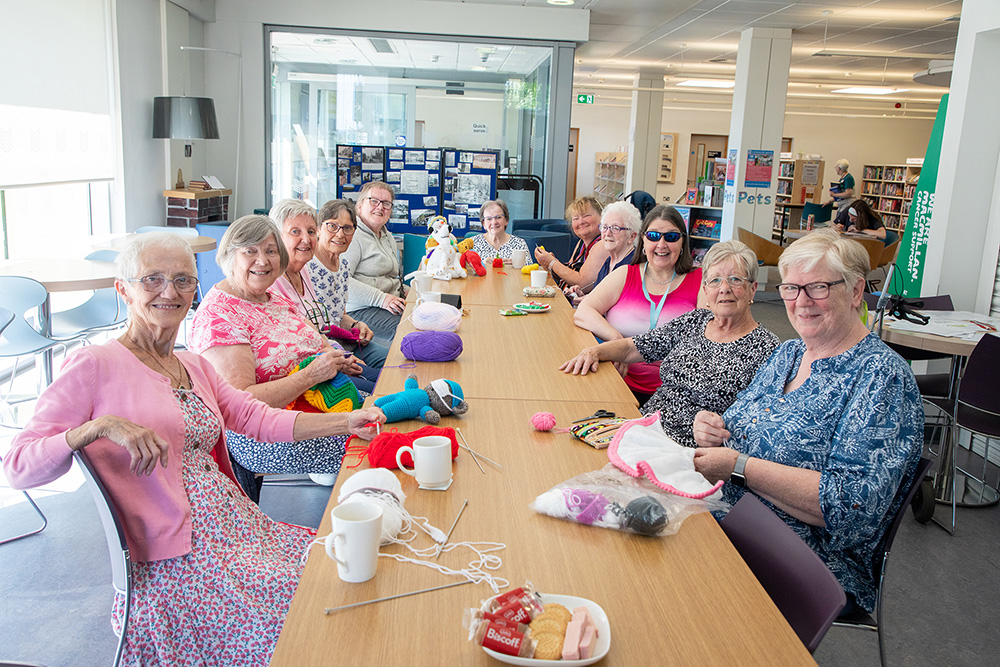 Attendees at a Knit and Natter session in a library