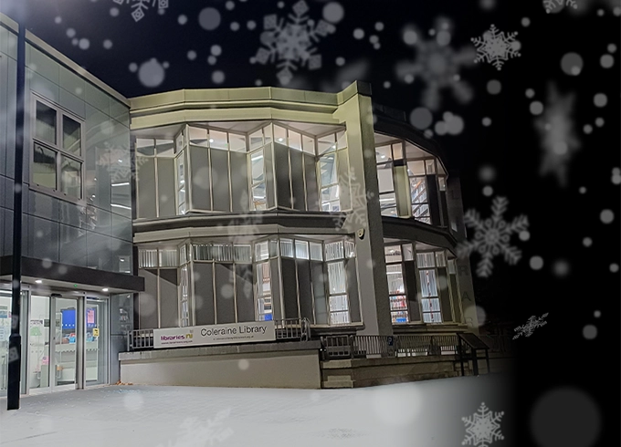 Feature tile which is a photo of a library at night