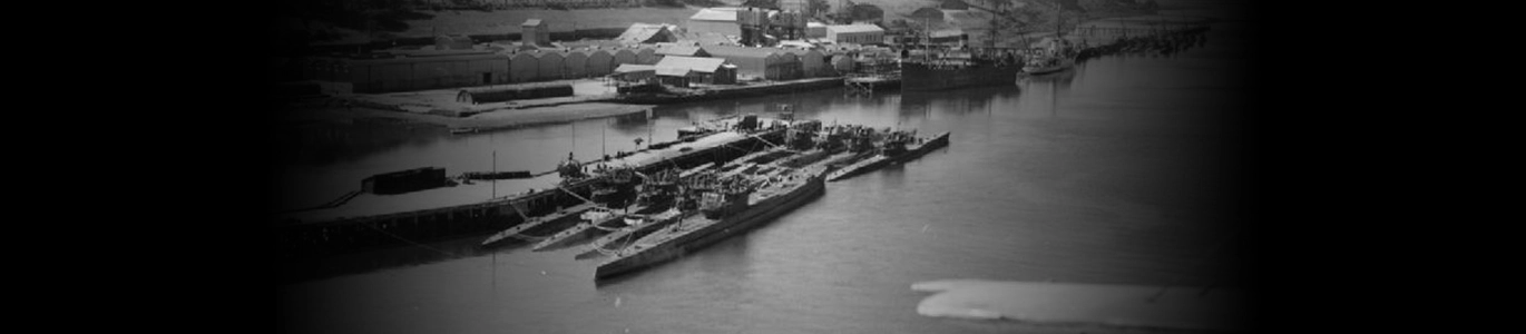 A black and white photograph of some U Boats