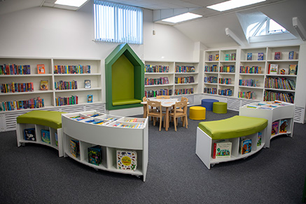 Photo of Ballycastle Library's interior showing the children's section