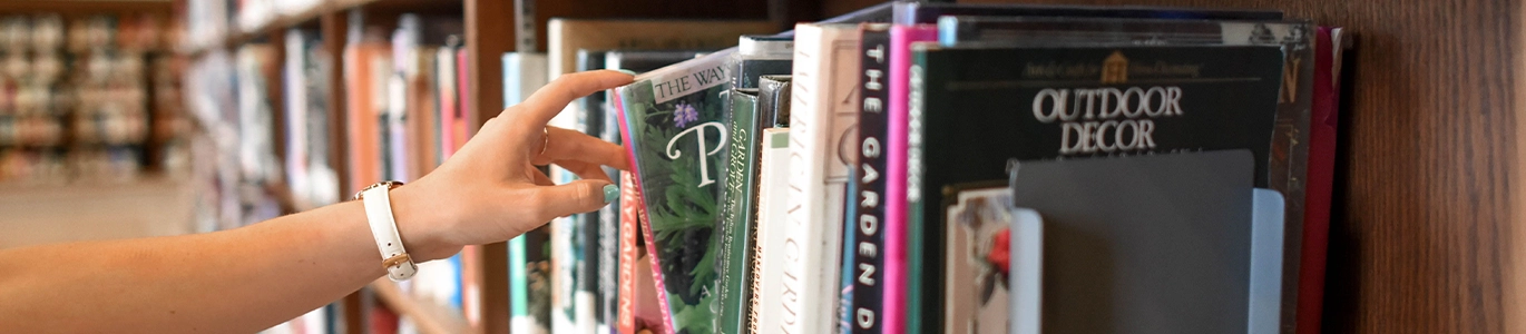A photo of a shelf full of books
