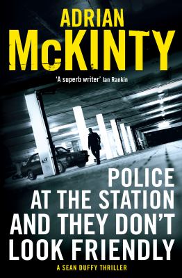 Police at the station and they don't look friendly by Adrian McKinty